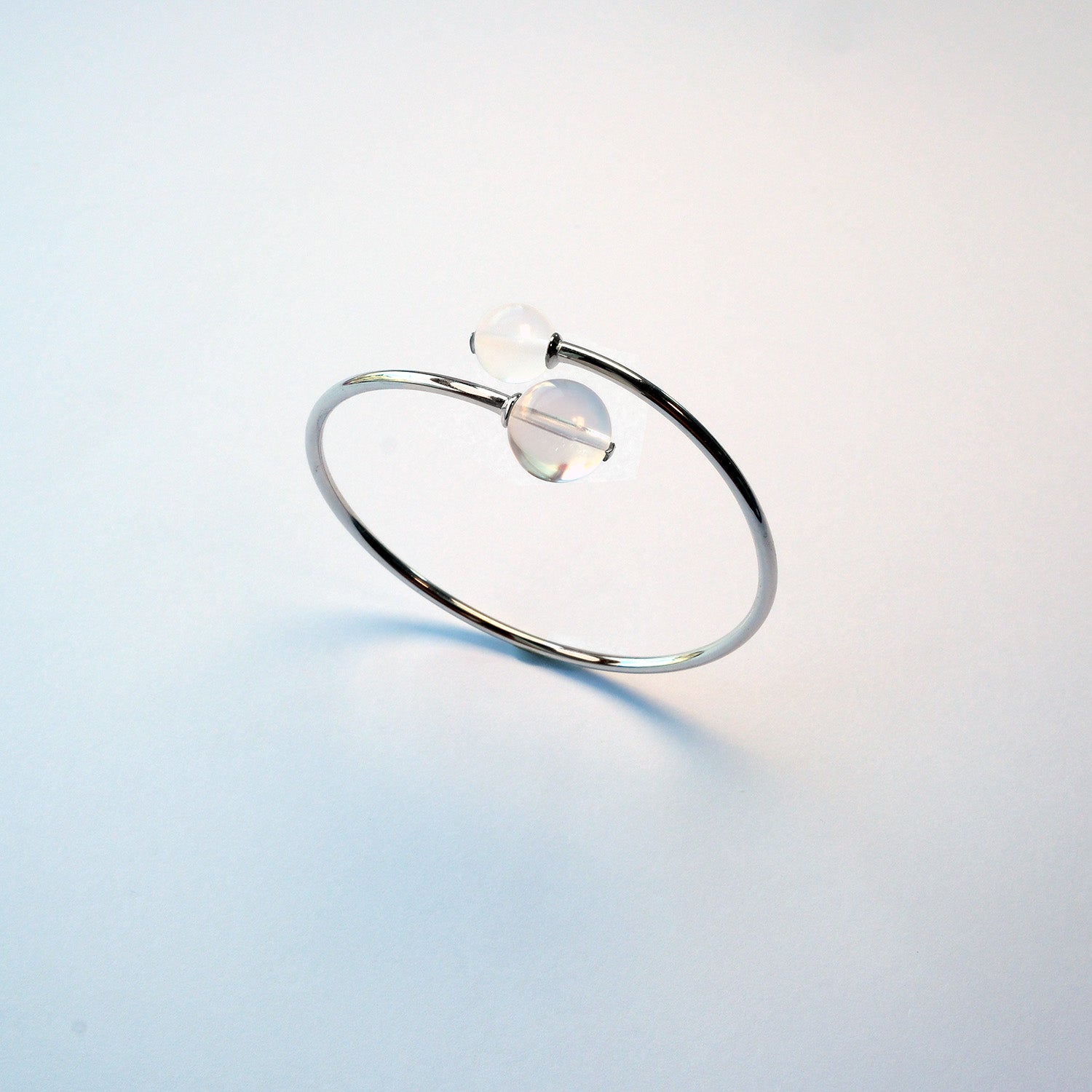 Clear Quartz and Milky Quartz sterling silver bracelet – handmade UK crystal jewellery for clarity.