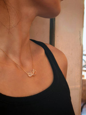 Double Star necklace with white gemstones – minimalist design for daily wear, mindfulness, and positive energy.