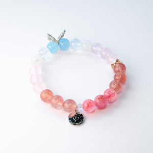 Butterfly Nebula bracelet collection with silver butterfly accents in blue and pink variations