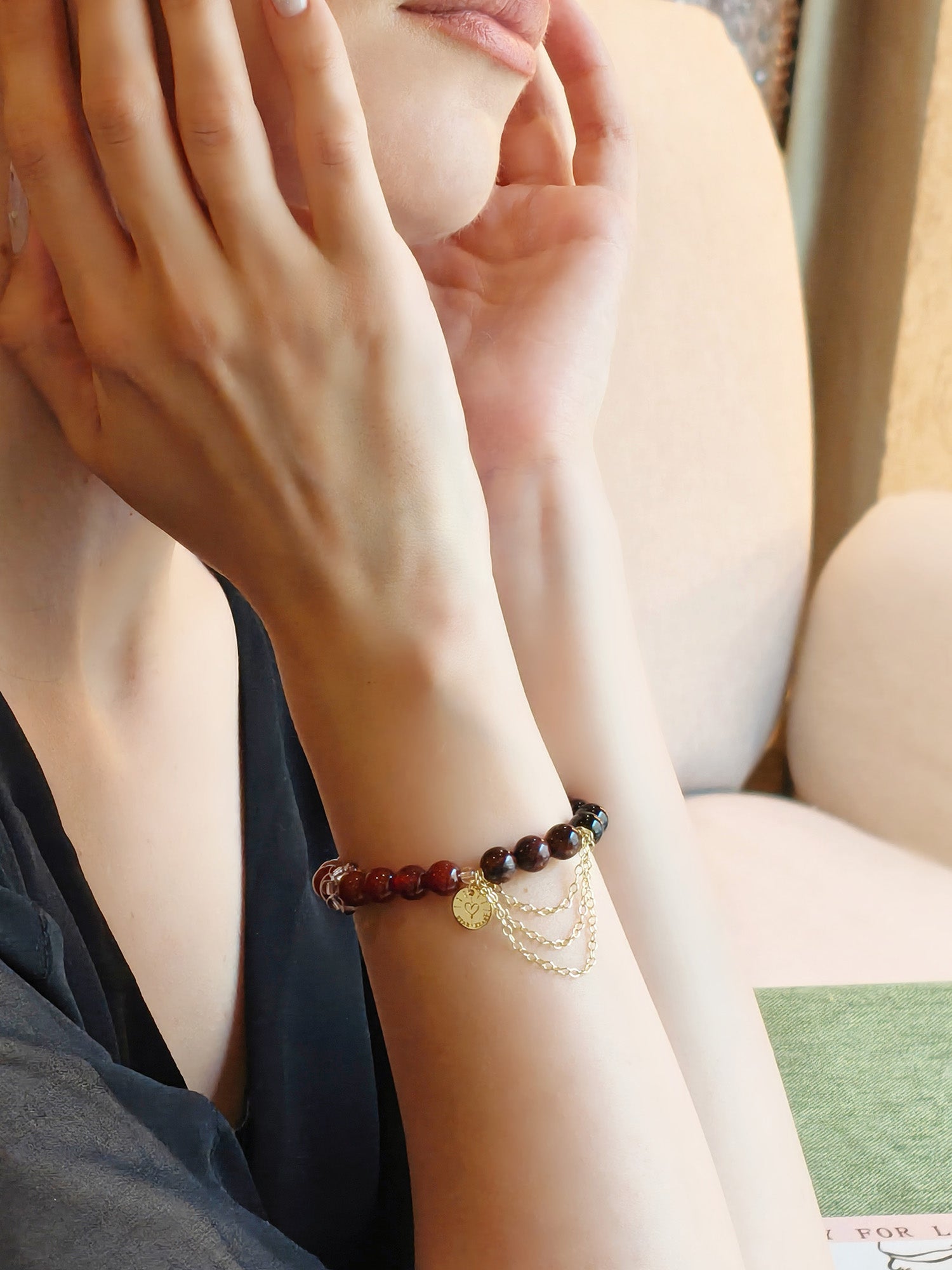 Woman wearing protective crystal bracelet for love and security