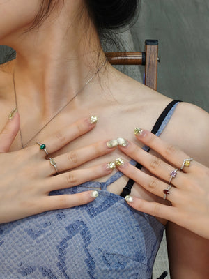 lifestyle of wearing Malachite Ring inspiring courage, clarity, and life-changing decisions, and multiple rings include: prehnitem garnet, citrine and lavender amethyst