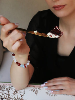 Lifestyle shot of woman with Orion Nebula bracelet for success