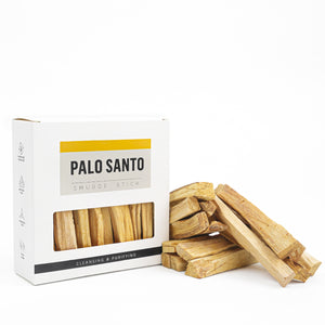Palo Santo sticks with packaging on a white background