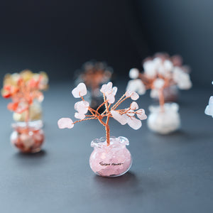 Decorative crystal trees in glass jars: rose quartz