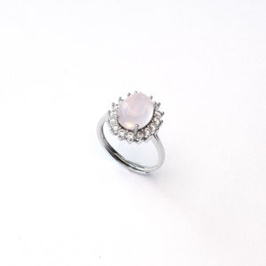 Rose quartz sterling silver ring radiating love and confidence in social gatherings