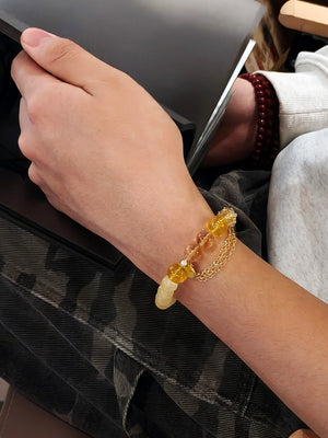 Man wearing citrine bracelet for prosperity and motivation