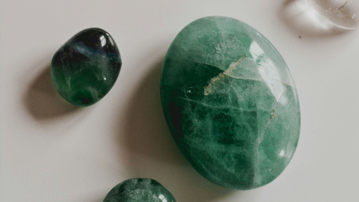 Polished aventurine gemstone in soothing green tones, stone of luck, prosperity and optimism