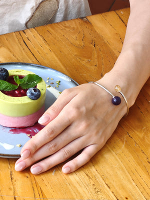 Double Star bracelet with purple and golden gemstones – perfect for meditation, business success, and daily wear.