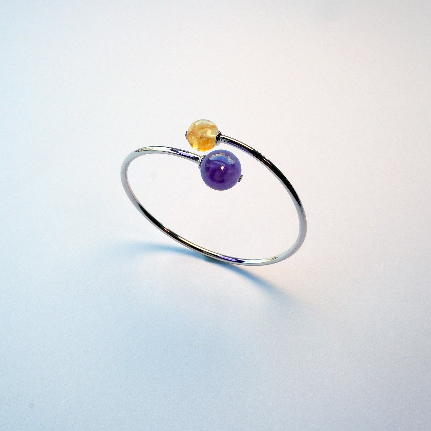 Amethyst + Citrine crystal bracelet – UK artisan design for spiritual growth and abundance energy.