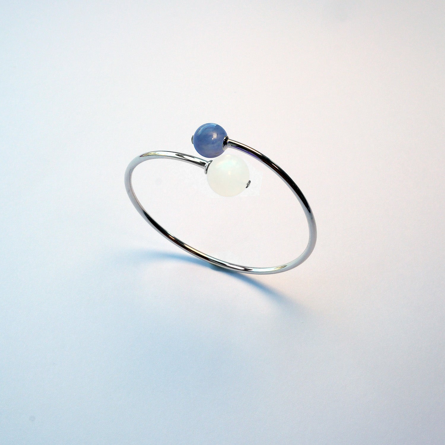 Double Star bracelet with moonstone and kyanite – meaningful gift for birthdays or new ventures.