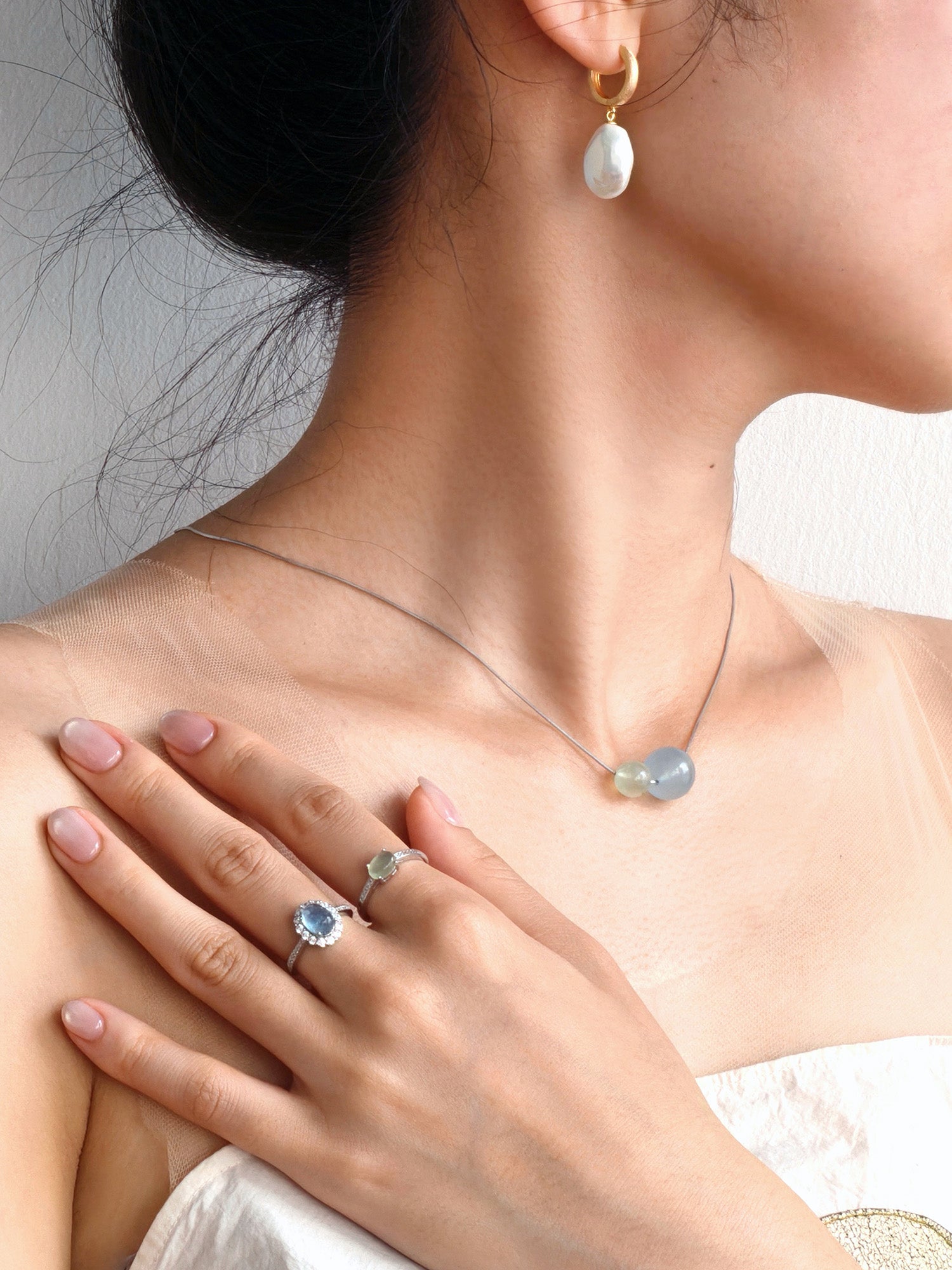 Handmade UK necklace for stress relief – aquamarine and prehnite crystal pairing for gentle energy and harmony.
Unique baroque pearl earrings on gold vermeil hoops: jewellery for authenticity and self-expression UK