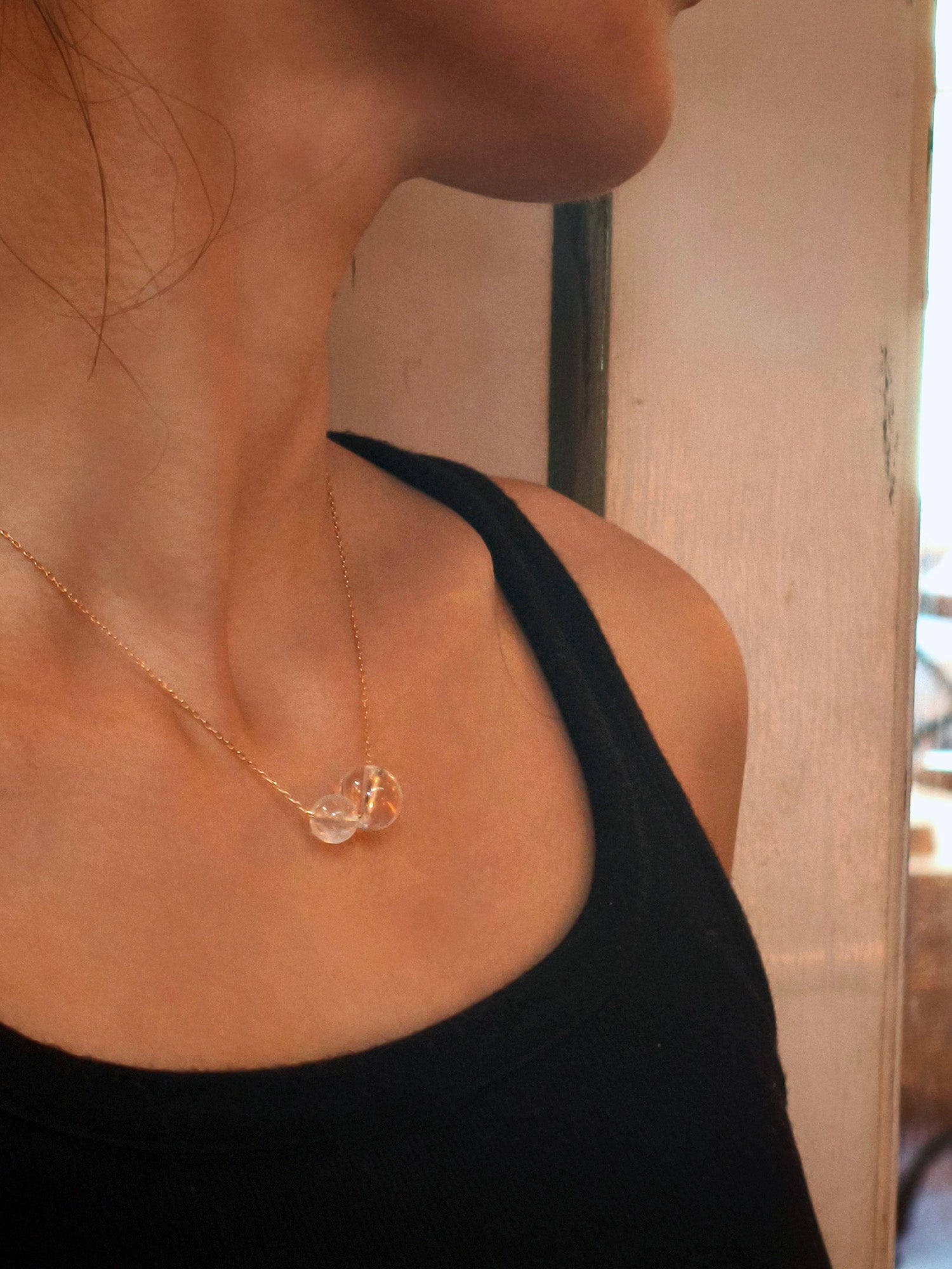 Double Star necklace with white gemstones – minimalist design for daily wear, mindfulness, and positive energy.