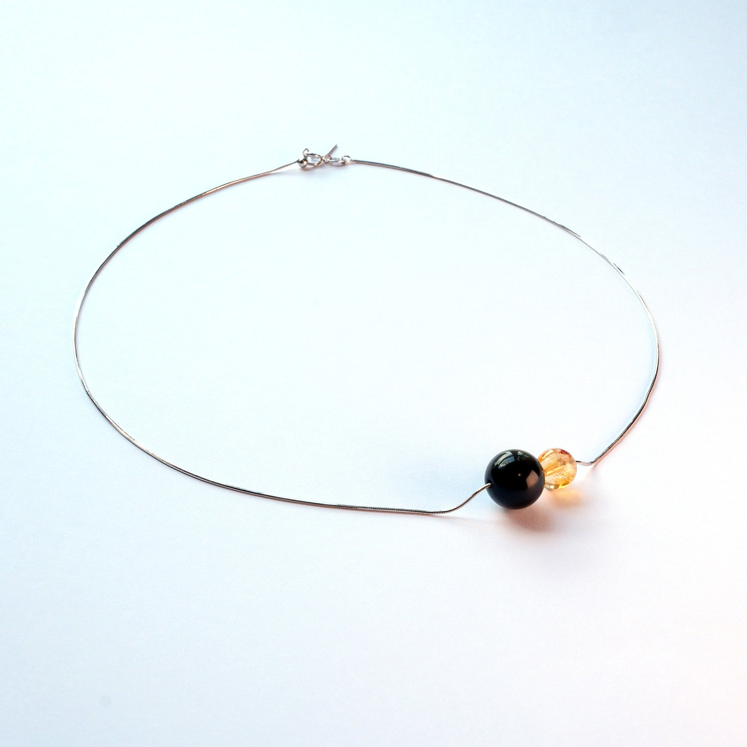 Black and golden gemstone necklace from Double Star Collection – unique design for business meetings, goals, and daily wear.