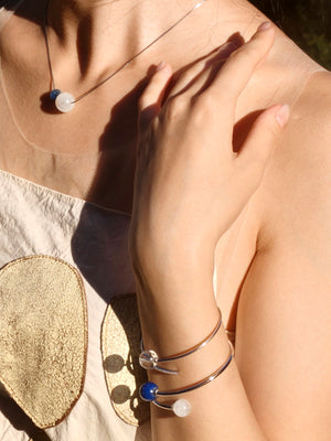 what do you wear for a classy party? Sterling silver necklace with moonstone and kyanite beads – unique gift for birthdays, holidays, or new ventures.
Sterling silver bracelet – lapis lazuli and moonstone crystal pairing for clarity.