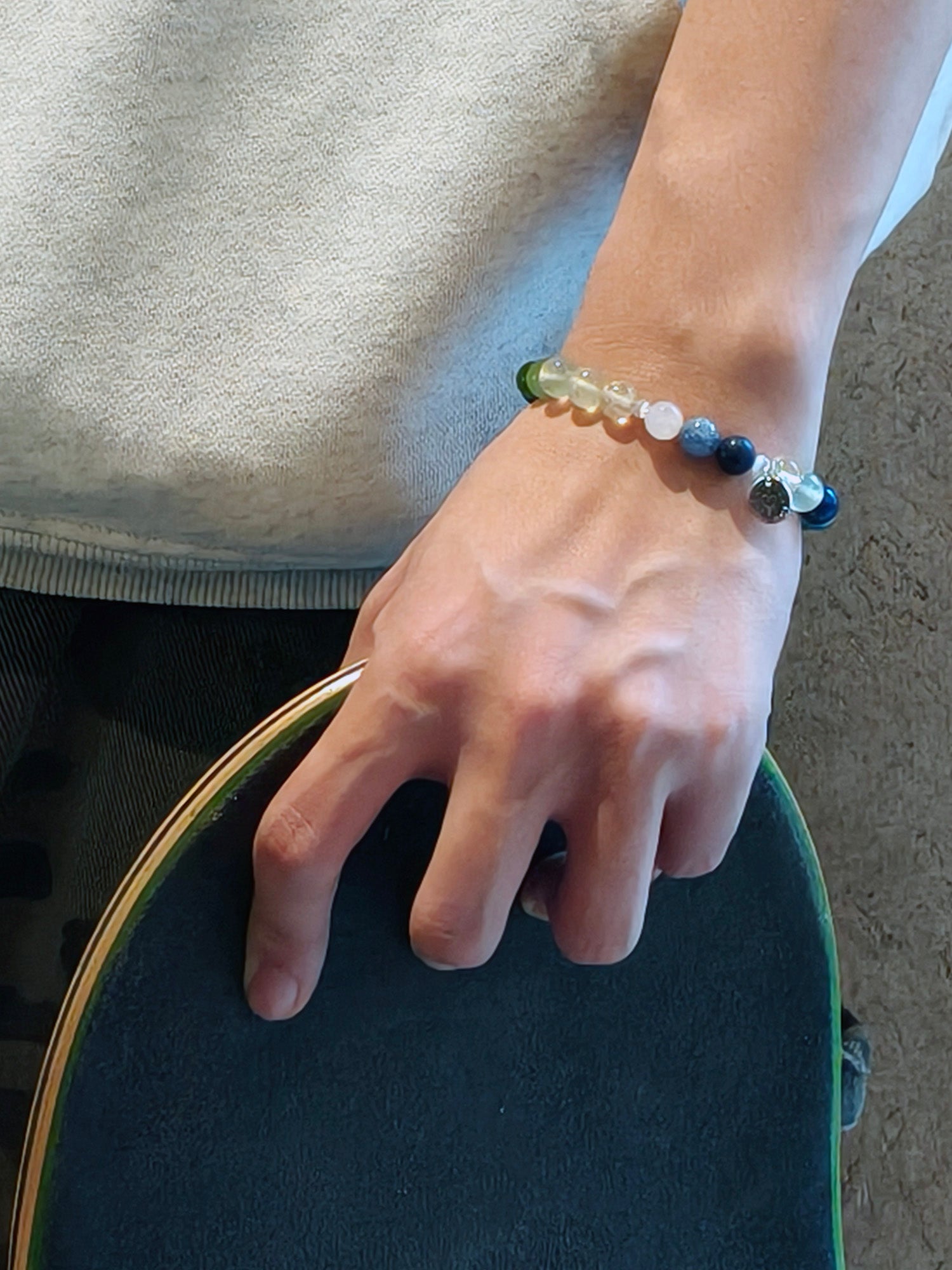 Man wearing Pleiades bracelet for connection and confidence