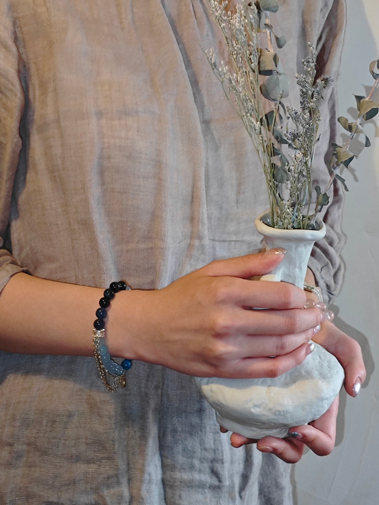 girl wearing blue crystal bracelet for confidence
