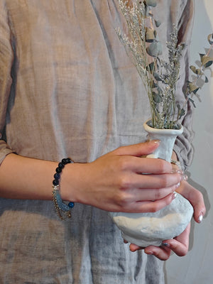 girl wearing blue crystal bracelet for confidence