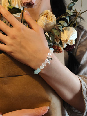Lifestyle shot of blue crystal bracelet for spiritual clarity and communication