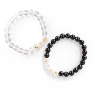 Personalised couple bracelet with white quartz and black obsidian beads, custom name jewellery UK