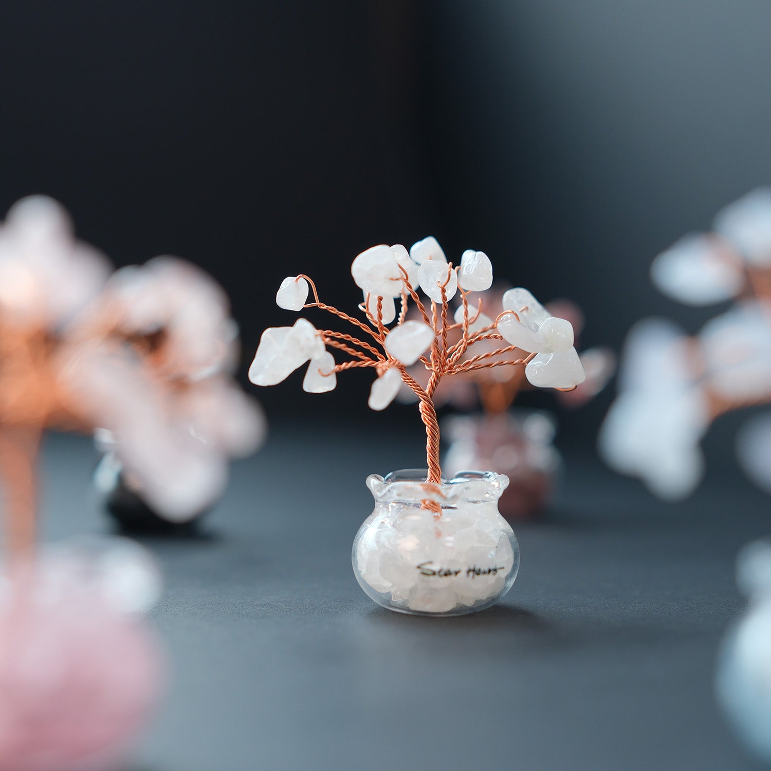 Decorative crystal tree in a small glass vase, clear quartz