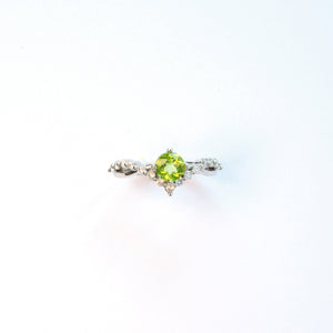 Peridot everyday gem ring, natural green gemstone ring symbolising vitality and renewal, affordable jewellery gift for August birthstone in the UK