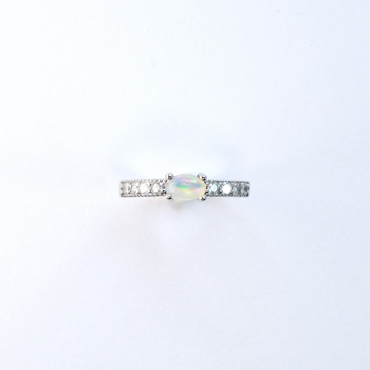 Natural opal gemstone ring in copper band, affordable iridescent jewellery for daily wear