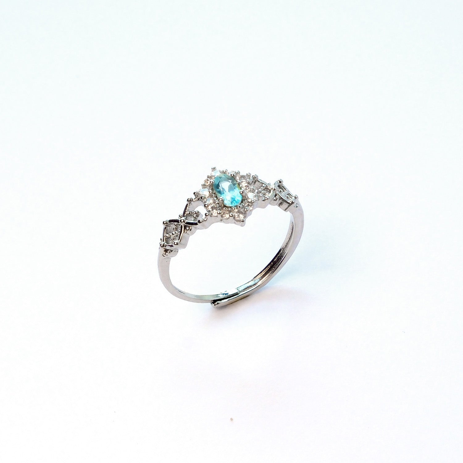 Swiss blue topaz everyday gem ring with vivid sky blue sparkle, symbol of clarity and expression