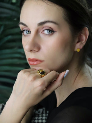 Natural tiger’s eye gemstone ring in copper band, grounding crystal jewellery for everyday wear