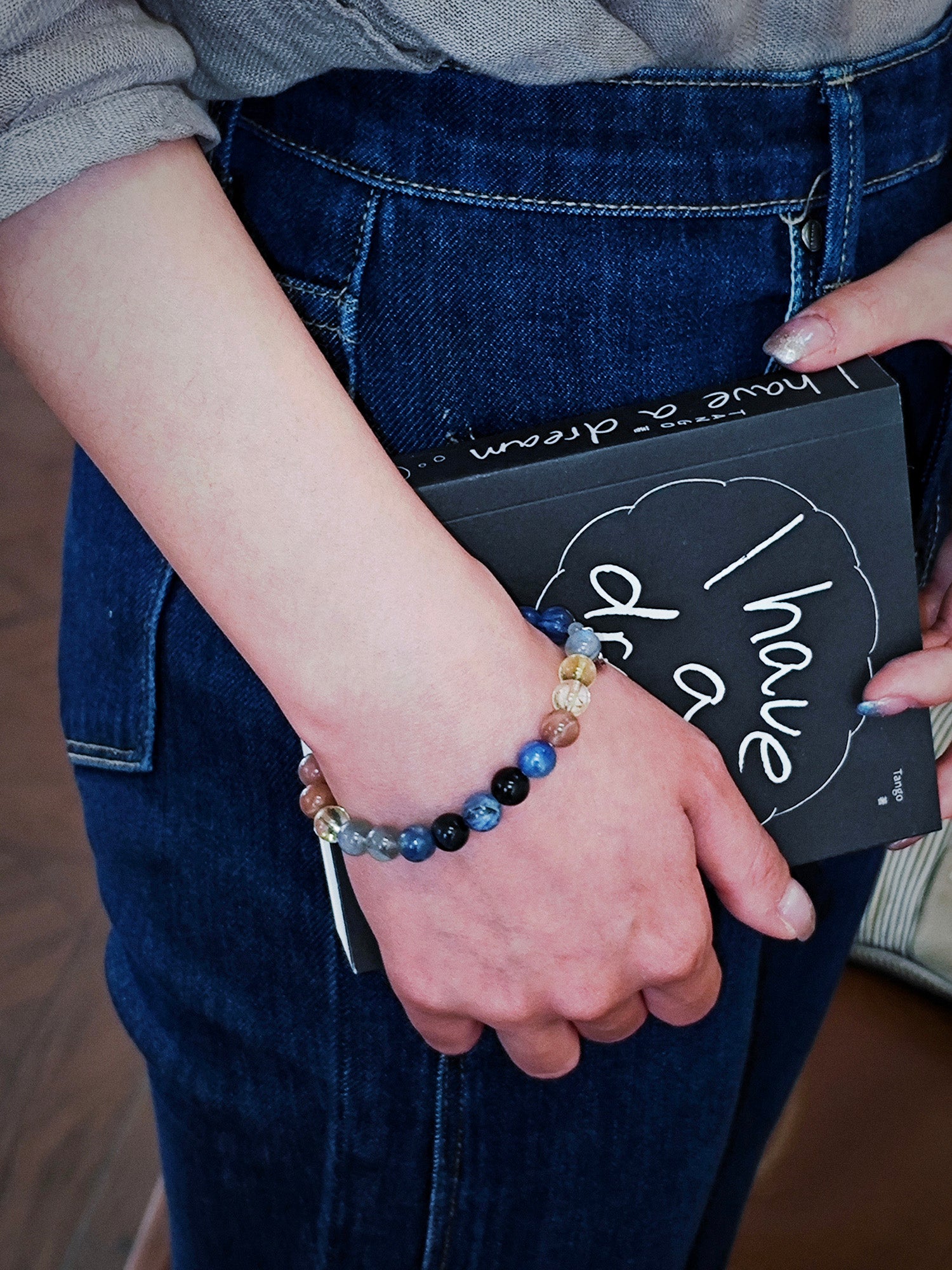 girl wearing natural crystal healing bracelet