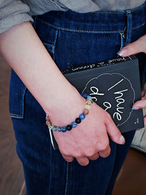 girl wearing natural crystal healing bracelet