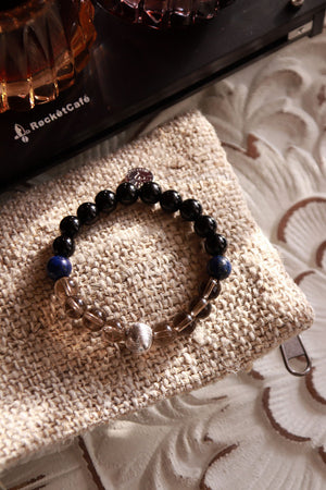 Lapis lazuli and smoky quartz Last Quarter moon phase bracelet, grounding gemstone design