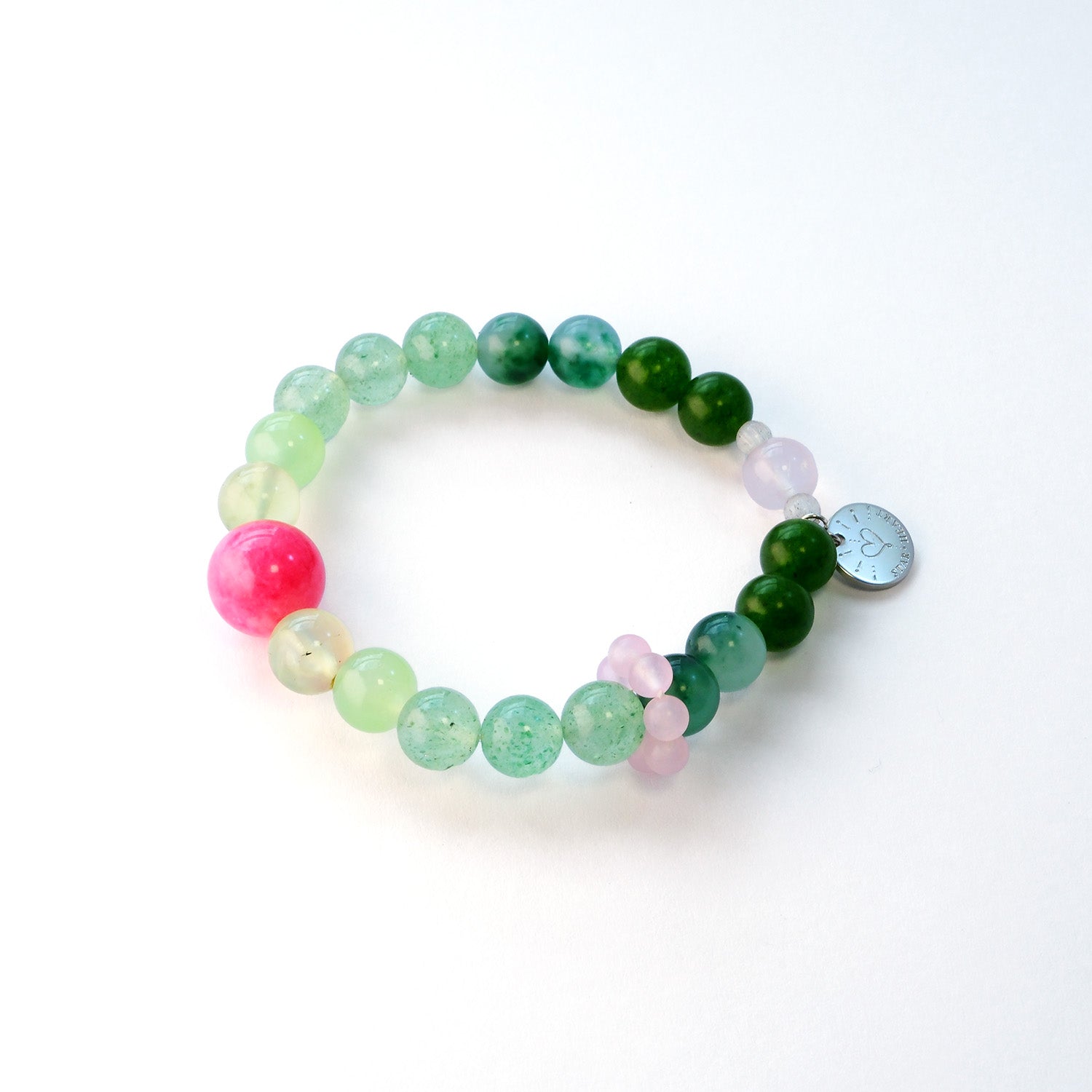 Close-up of green strawberry quartz bracelet for fresh ideas and renewed energy