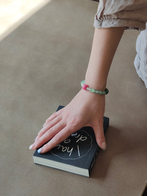 girl wearing green strawberry quartz bracelet for inspiration and creative flow