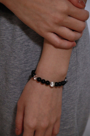 Obsidian and clear quartz New Moon bracelet by Star Heart, handcrafted moon phase jewellery