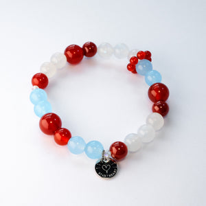 Orion Nebula red agate and aquamarine crystal bracelet for success, ambition, and courage