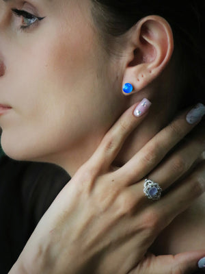 woman wearing Blue Agate Sterling Silver Earrings and aquamarine ring