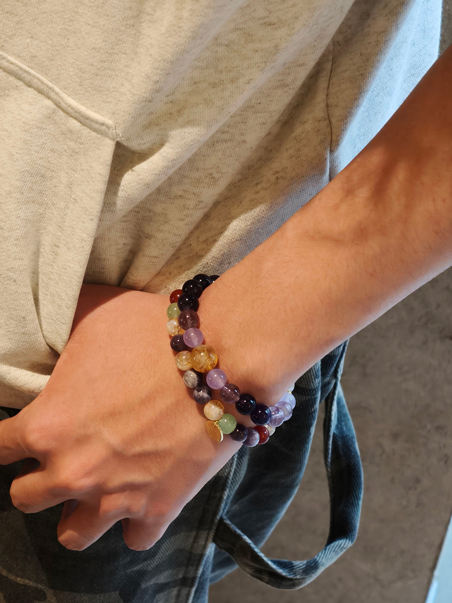 men wearing natural gemstone bracelets