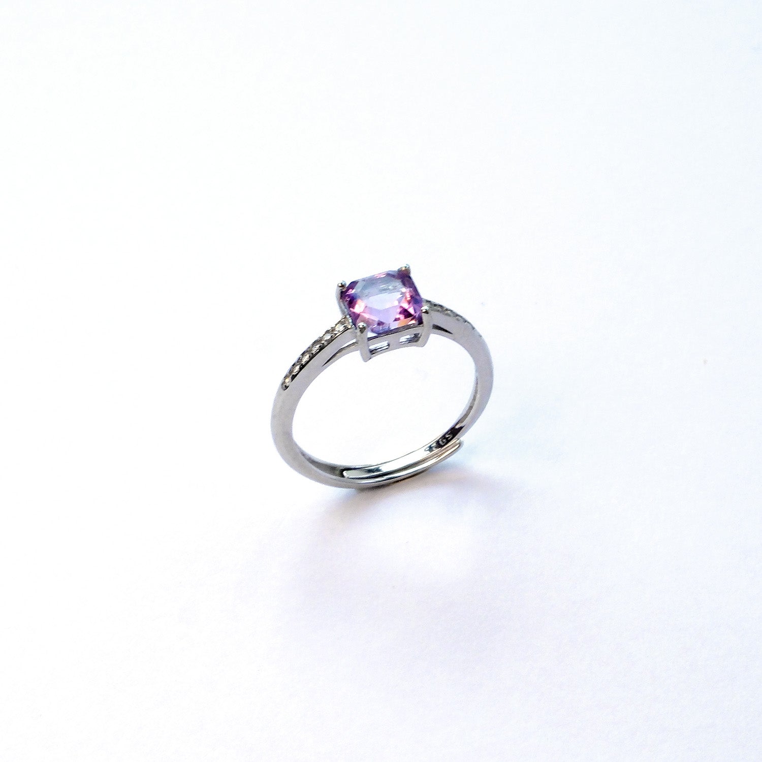 Square lavender amethyst silver ring symbolising intuition and stability in meditation
