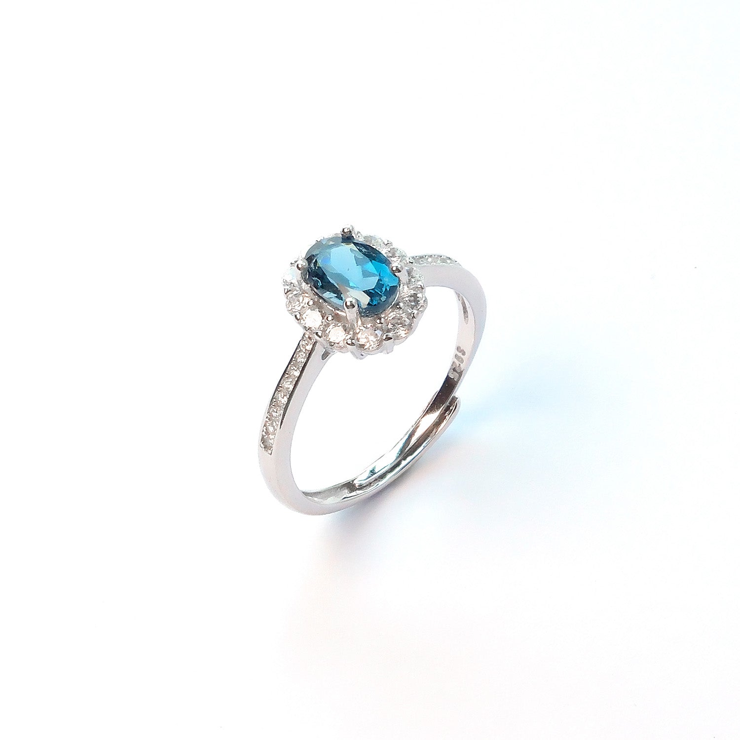 London blue topaz silver ring empowering confident speech during work meetings
