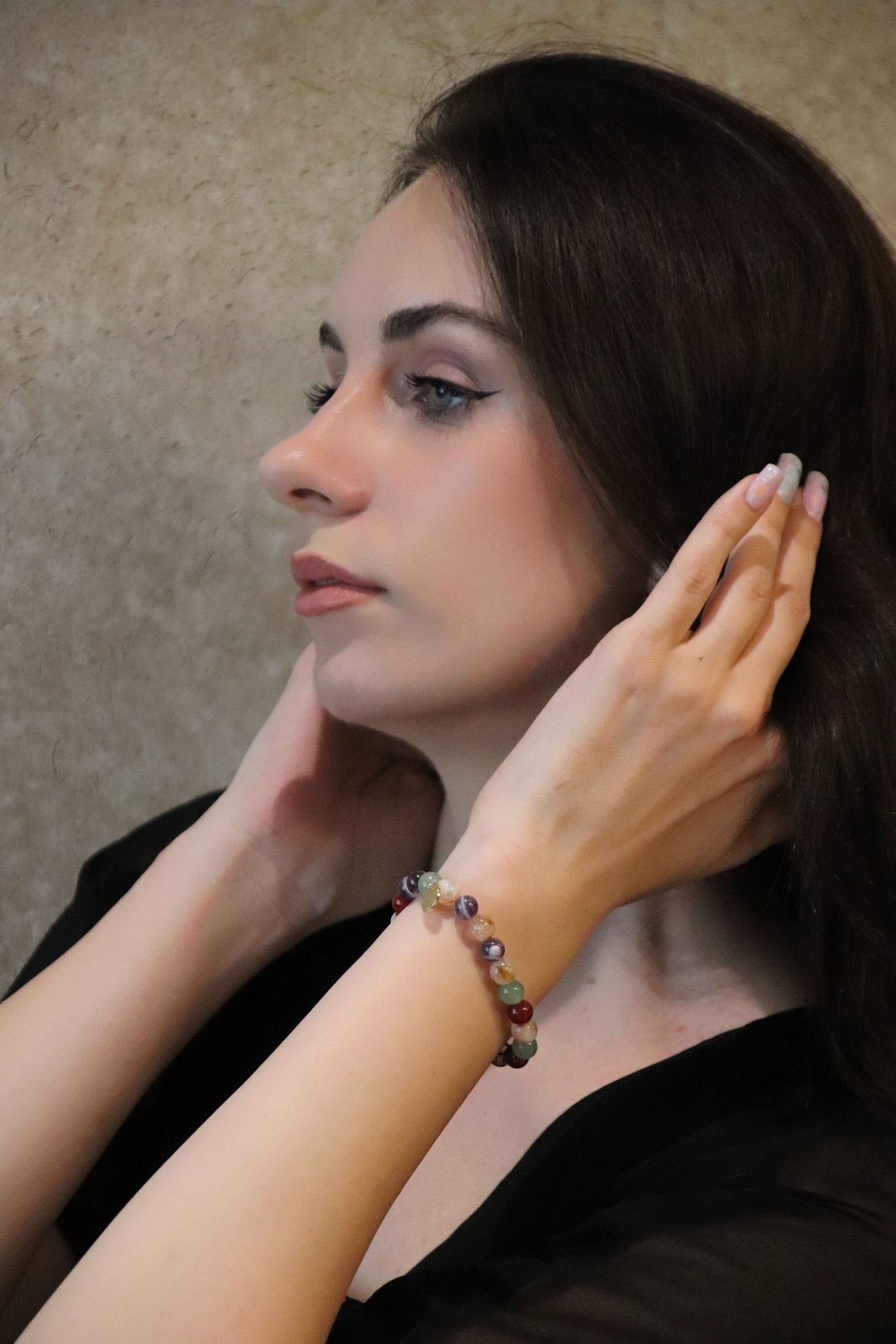 woman wearing supernova bracelet for protection and health