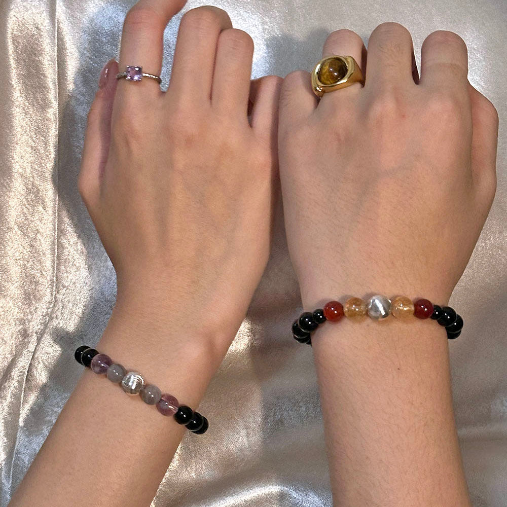 Waxing Crescent and Waning Crescent crystal bracelet worn on wrist, warm-toned gemstones for everyday confidence