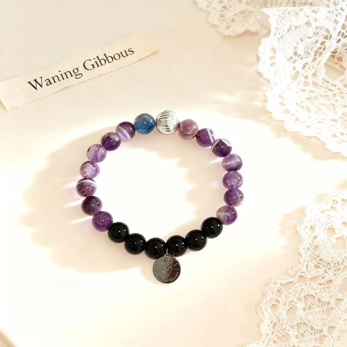 Amethyst and Kyanite Waning Gibbous bracelet for communication and empathy
