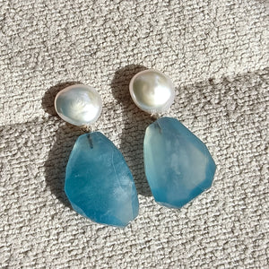 Unique aquamarine pearl earrings on fabric background, sterling silver handmade design